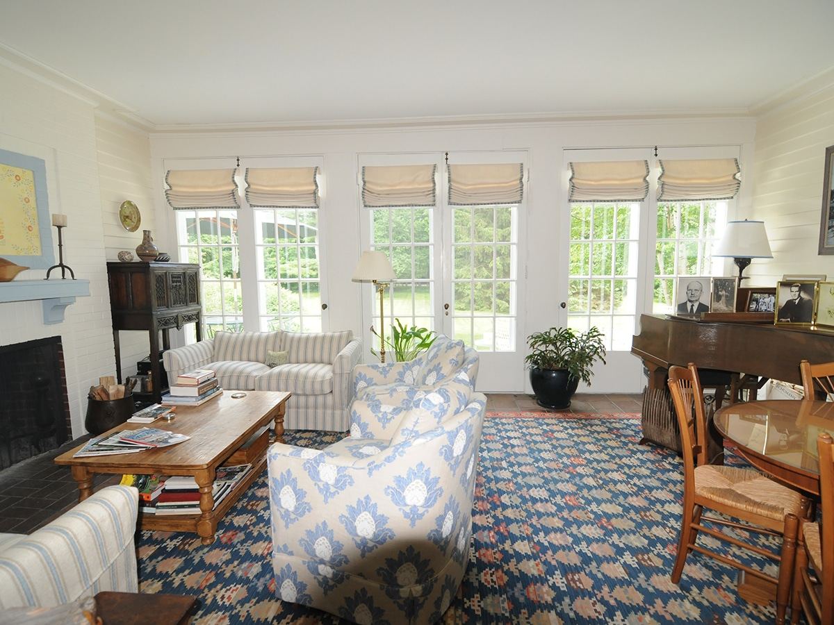Sunroom with piano and garden doors