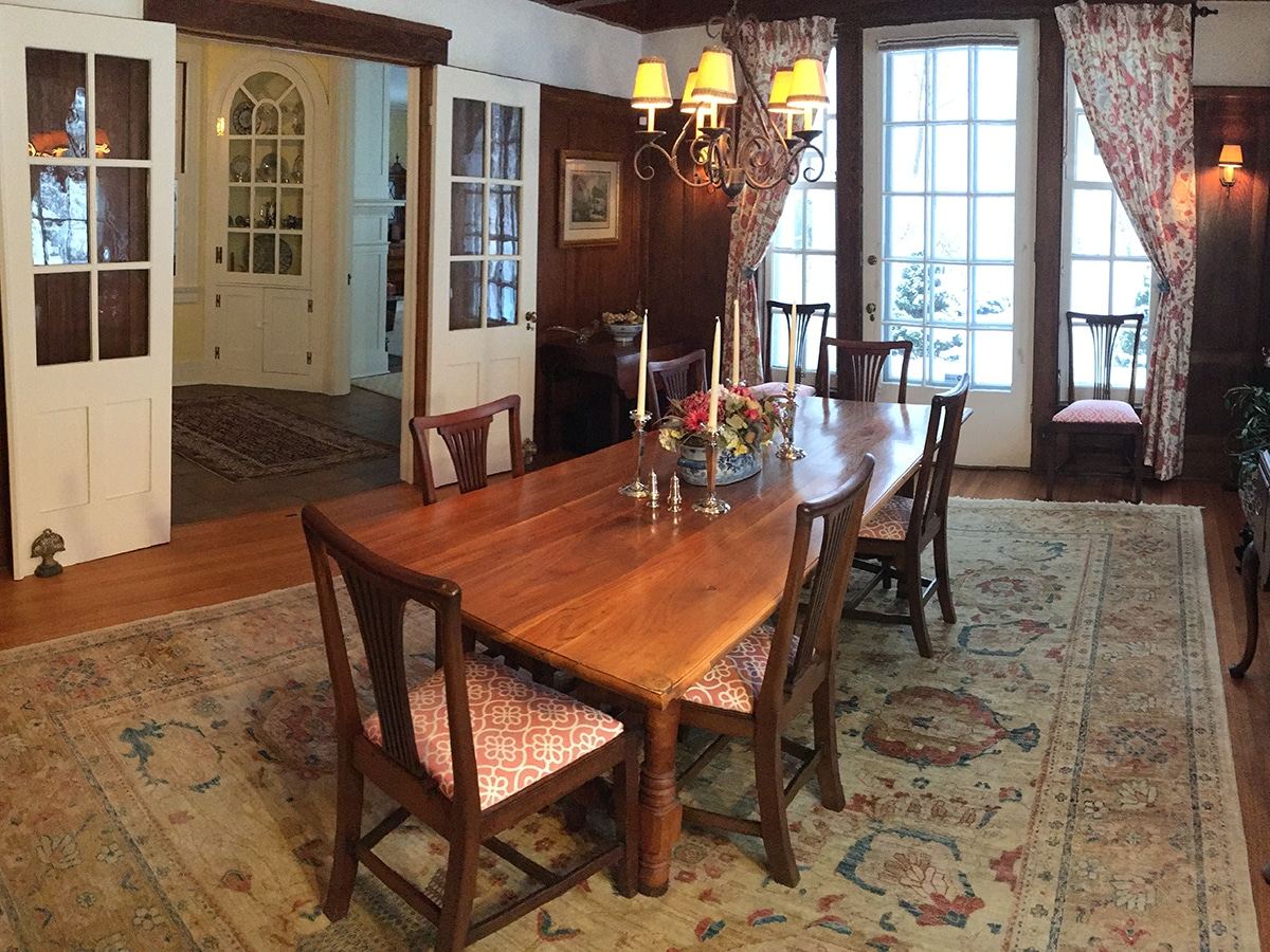 Paneled dining room set for breakfast
