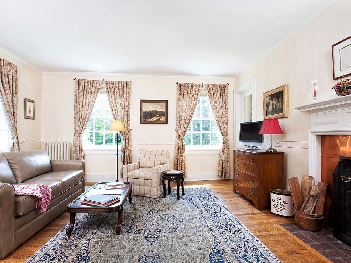 Elisabeth Willcox Suite sitting room with fireplace
